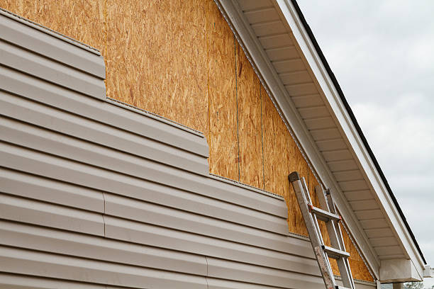 Professional Siding Replacement technician working in Farmville, NC